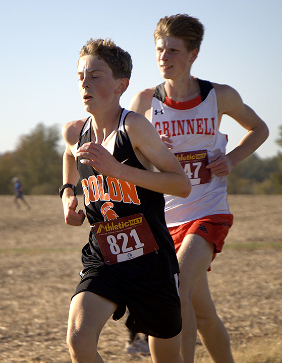 Left: Standout freshman Anders Holmes leads the way for Solon boys' varsity, earning WaMaC Second Team All-Conference honors last Thursday in the conference meet at the Antioch Christian Church in Marion.