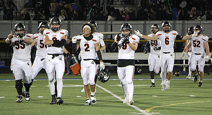 The Solon Spartans celebrate a 34-27 upset win Friday over No. 5 Benton Community in Van Horne. The Bobcats handed Solon (No. 9) their first loss of the season on October 4.