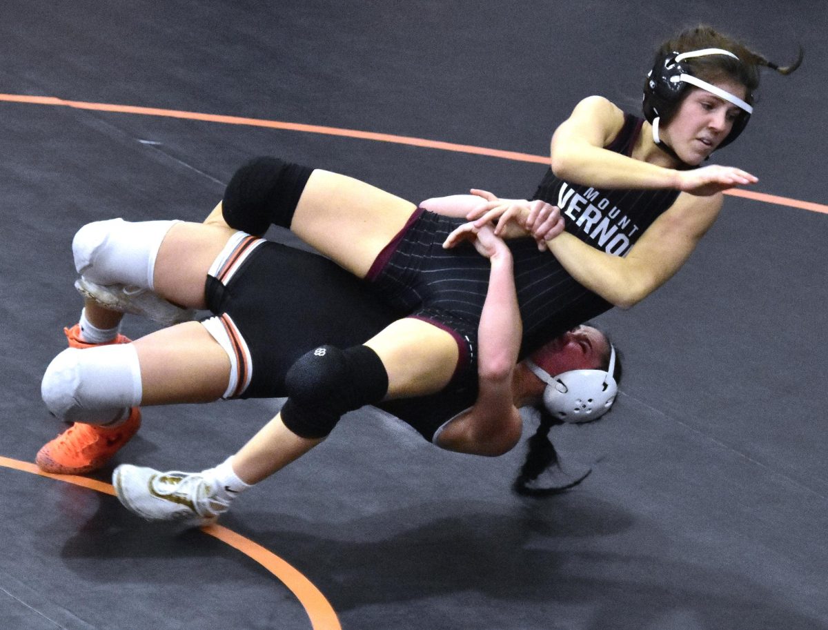 McKenna Rogers takes down Mount Vernon’s Kiersten Swart in the 110-pound match Thursday, Jan. 23 at home. Swart and Rogers battled through nearly the full three periods before Swart got the advantage over Rogers, pinning her in 5:51. Mount Vernon took the dual meet 49-27.