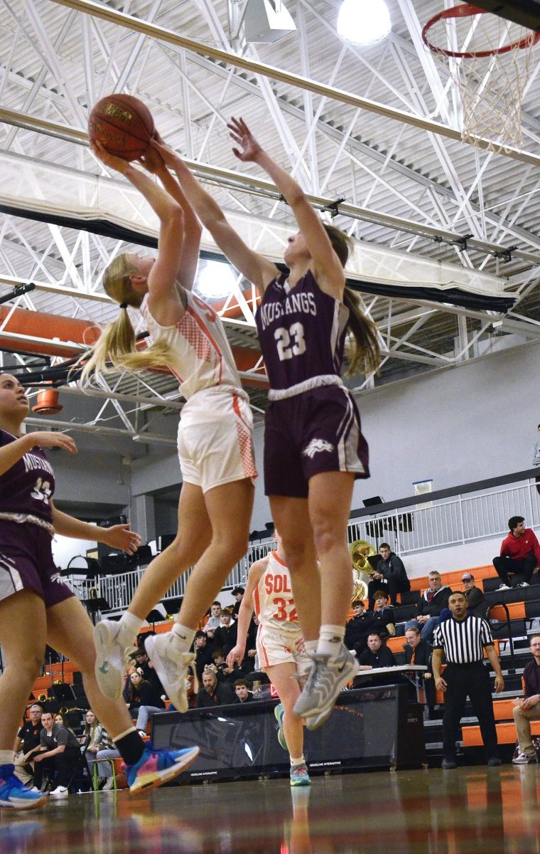 Kobi Lietz, the only senior on the Lady
Spartans’ roster this season, puts up a two point shot as Independence’s Addison Lange attempts to block Friday, Feb. 7 on Senior Night.