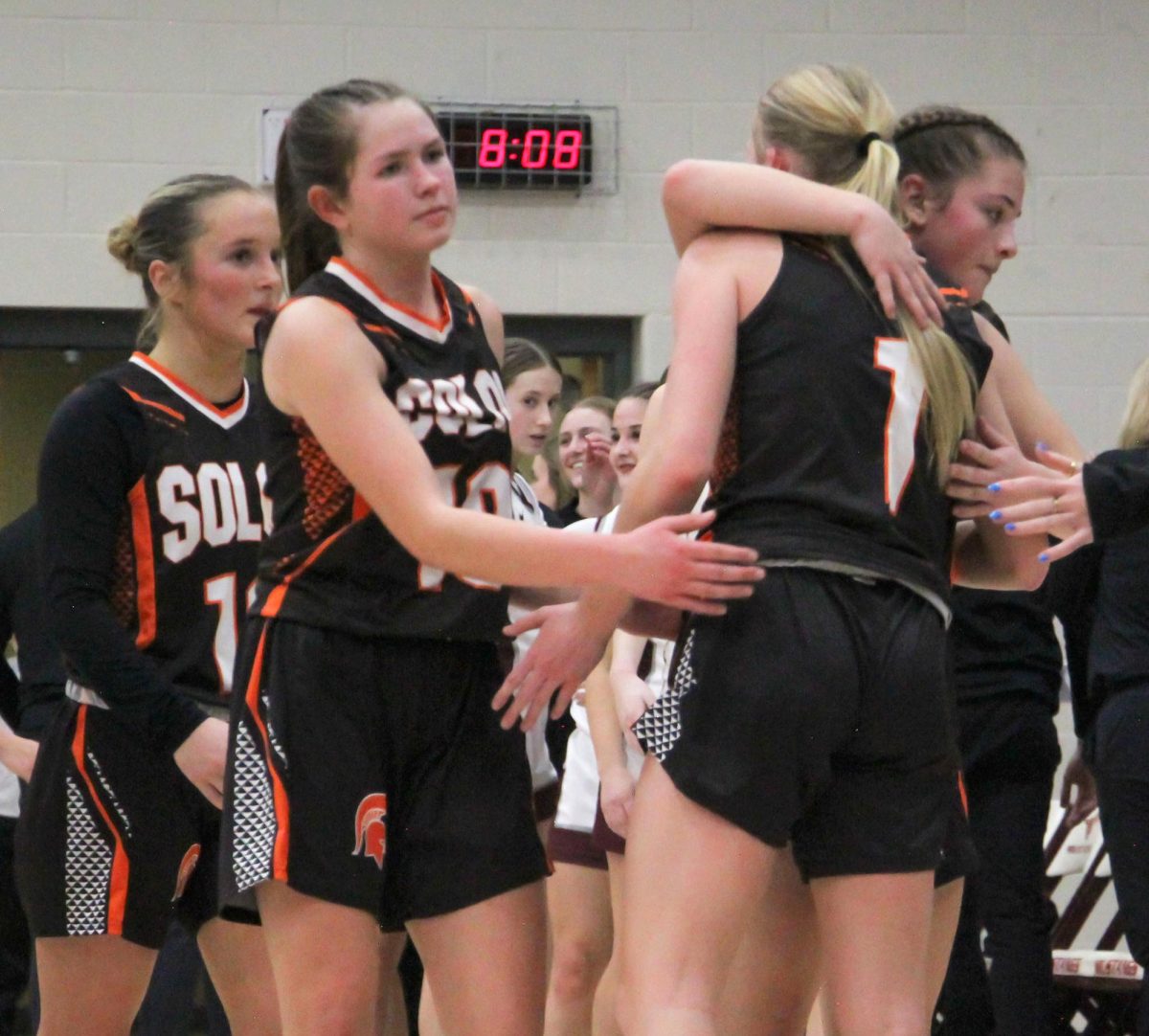  The Lady Spartans comfort and console each other in the wake of a 52-32 loss to rival Mount Vernon in a Class 3A Region 1 semifinal game Wednesday, Feb. 19 at Mount Vernon.