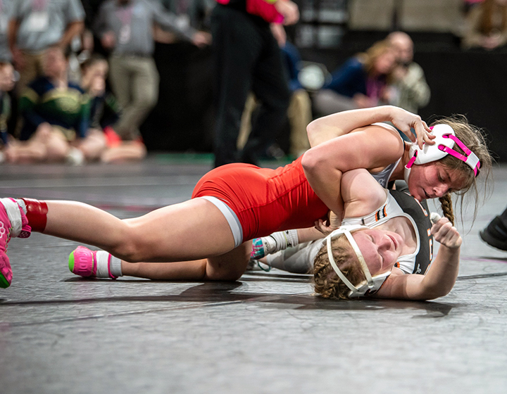 Kara VeDepo tries to resist her opponent during the first day of the 2025 IGHSAU State Wrestling Tournament at Xtream Arena in Coralville. VeDepo entered the tourney ranked No. 1 at 105 lbs. by IAwrestle but fell in the first round and first consolation round, ending her championship quest with a 36-4 record this season.