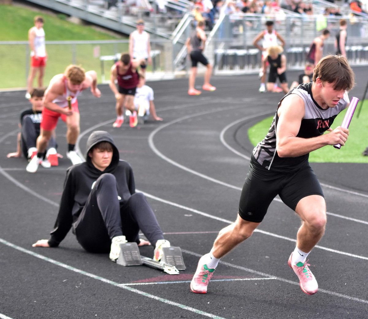 Senior Cole Carney leaves the blocks for the first leg of the sprint medley relay Tuesday, April 22 in Solon’s Denny Gruber Co-Ed Relays. Carney, junior Brady White, senior Evan Burg, and junior Eli Kampman not only won the event in 1:37.38 but also set a new meet record in the process. The previous time of 1:37.63 was set by Solon in 2023.