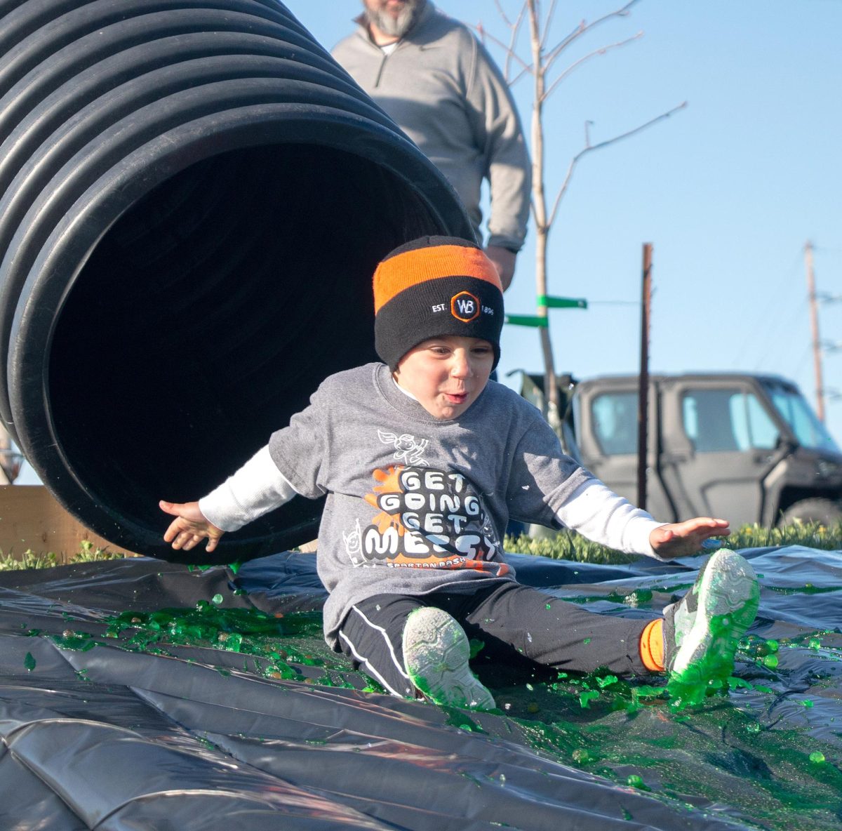Rexton Schmidt goes down a slide filled with Orbeez during the Spartan Dash at the Solon Recreation and Nature Area Solon, Iowa, Saturday, Apr. 26, 2025. This was the first event in the 11 part run.