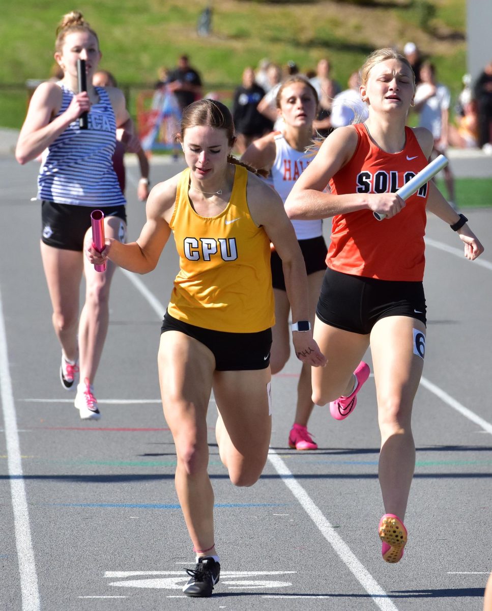 Kobi Lietz crosses the finish line in the 800-meter sprint medley relay Thursday, May 8 in the WaMaC Super Meet at Mt. Vernon HS