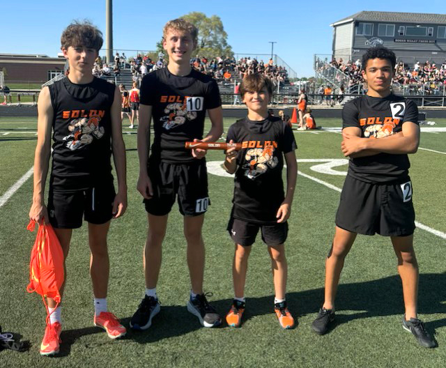 Solon’s WaMaC champion 4x800 team celebrates a school record. Left to right Kolar, Svalstad, Kabela, and Bevans