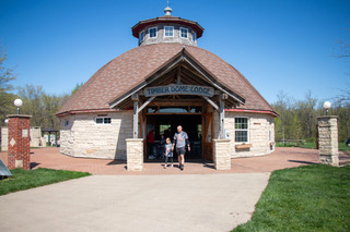 The Timber Dome Lodge opened in 2014 and was built by Dick Schwab, who has also built other round barn structures in Iowa. The lodge was partially built the old-fashioned way by community volunteers. Beams were made on site, concrete was hand-poured, the mortar for the limestone was all hand-mixed.