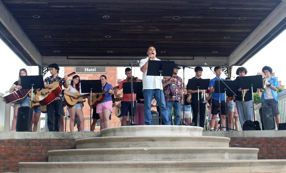 Martin Chapa sings a classical Spanish song with confidence and emotion as Solon HS students accompany him during the Solon Mariachi Band’s performance at the Music on Main Street concert Wednesday, June 4, in downtown Solon.