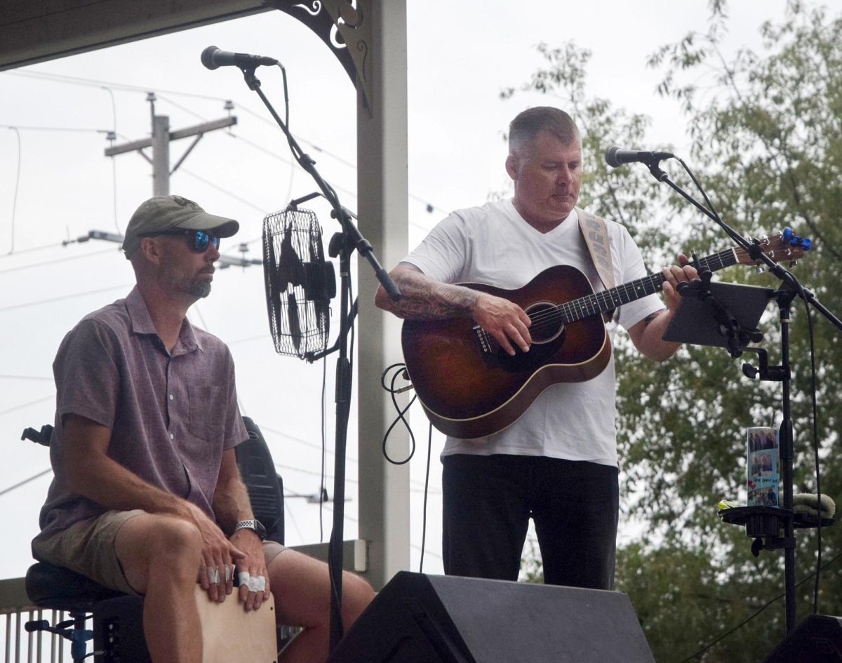 Guitarist Tom Grubb and percussionist Chris Sawyer of Sugar & Spice get in a groove at the Main Street bandstand during Solon Beef Days Friday, July 18.