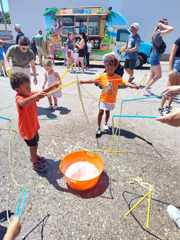 Library fun at Kids Corner during Solon Beef Days. We enjoyed giant bubble magic and building LEGO derby cars to race