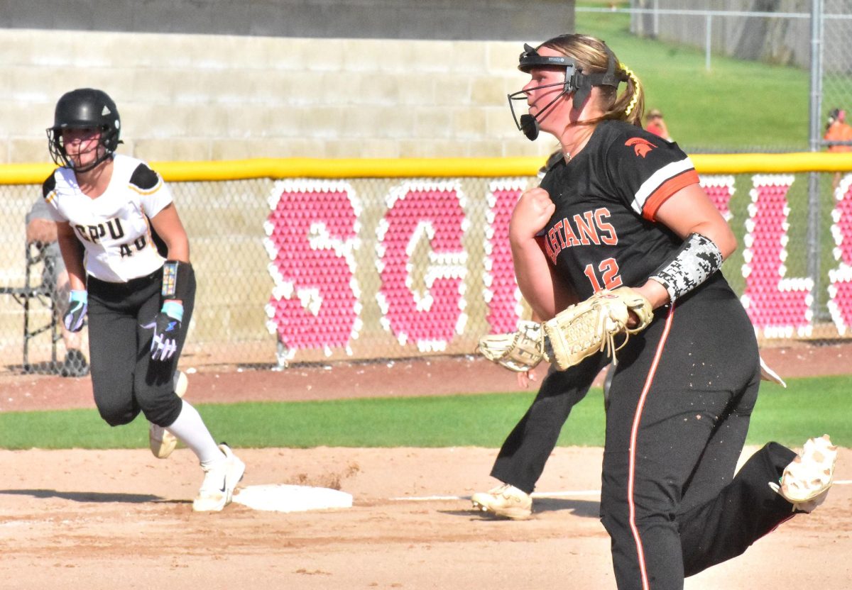 Sophomore Emerson Miller delivers a pitch as CPU’s Mya Hillers leads off Wednesday, June 25 during game one of a varsity doubleheader in Solon. The Lady Spartans split with the Stormin’ Pointers, dropping game one 4-1 and coming back for a 6-5 win in the nightcap.