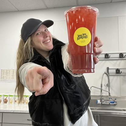 Taylor Mattson strikes a pose with one of the classic tea drinks offered at Solon Sips.