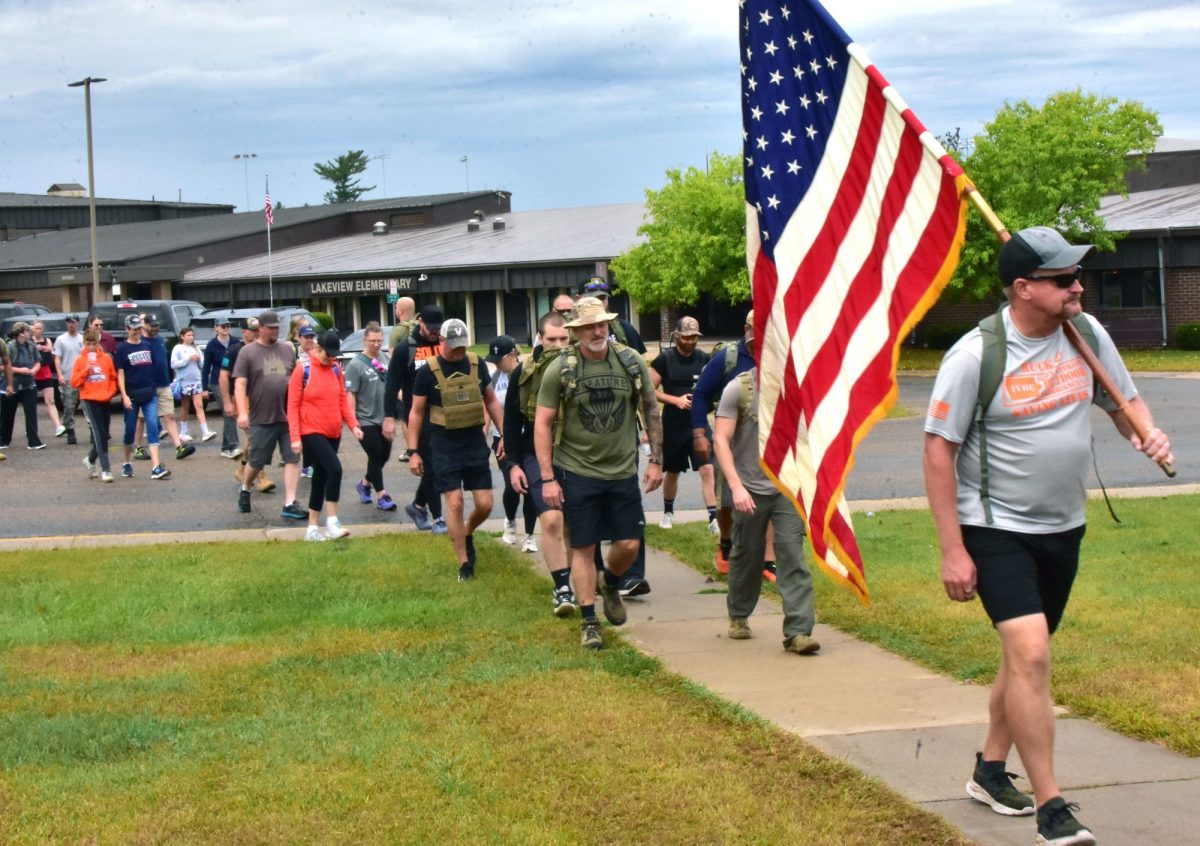 Brian Romans, founder of Romans Warrior Foundation and curator of the Global War on Terror Wall of Remembrance, takes the point to lead the third annual RUCK 22 march for veterans suicide awareness Saturday, Sept. 20. The 2.2-mile hike raised funds for Iowa Veterans Outdoor Experience, a Solon-based all-volunteer veterans advocacy group that provides recreational and healing opportunities for veterans.