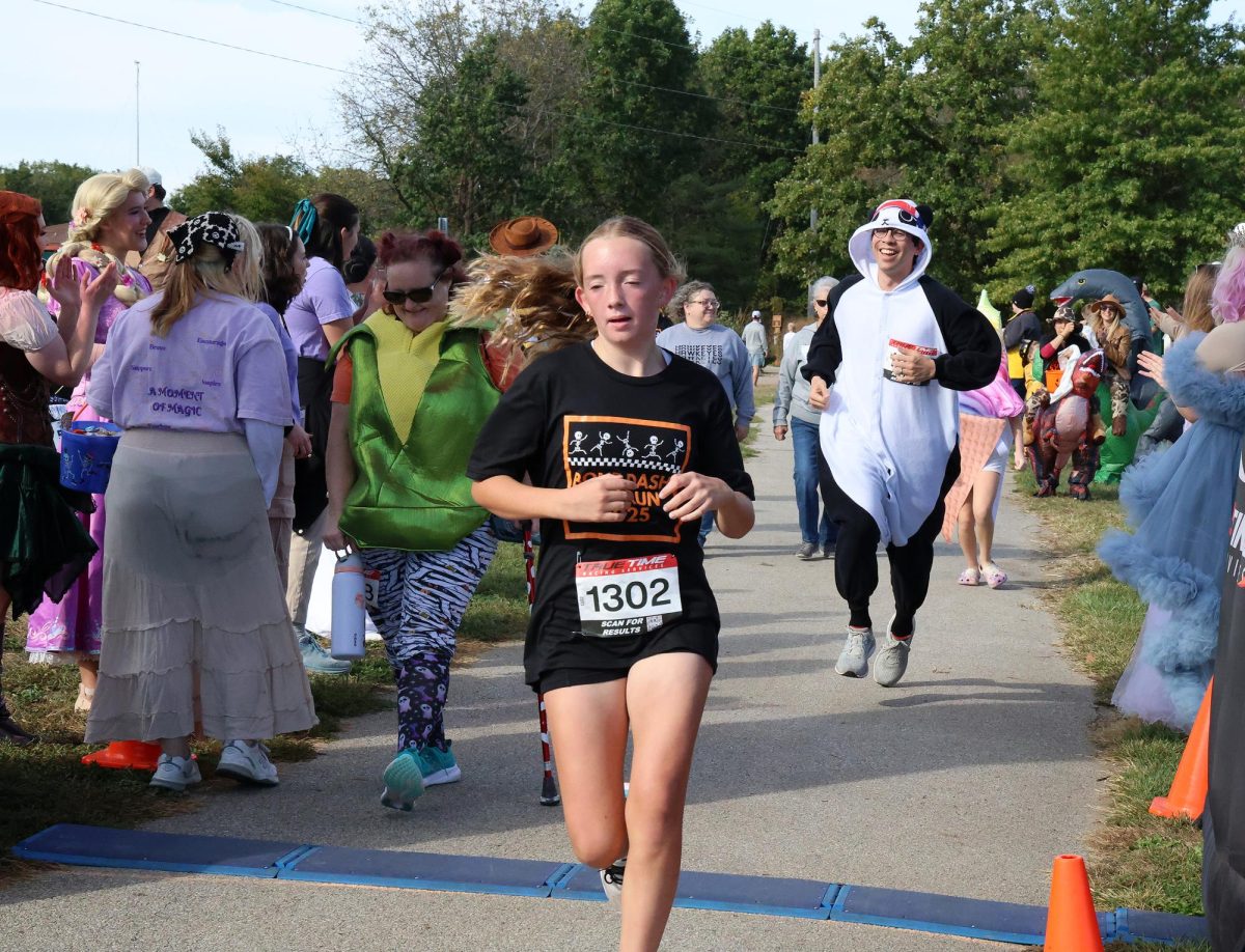 Greenlee Heuton closes her eyes as she crosses the finish line at the Bone Dash Saturday, October 10 at the SRNA. Heuton is a patient at Stead Family Children’s Hospital and is being treated for Juvenile Idiopathic Arthritis.