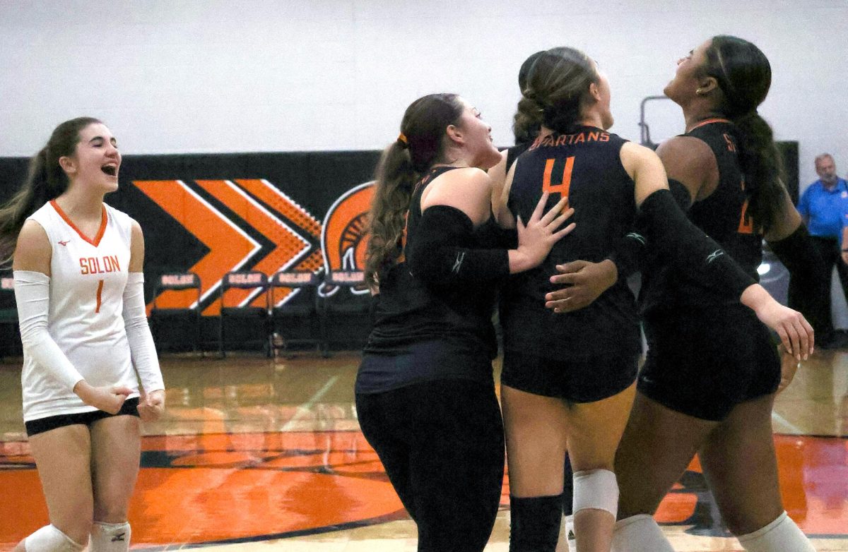 The Lady Spartans have a celebratory moment during the 2025 WaMaC Conference Tournament Thursday, October 16 in Solon.