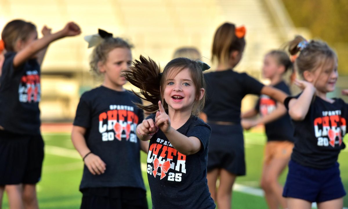 167 girls from preschool through 5th grade performed as cheerleaders during halftime of the frosh-soph game Friday, October 3 under the direction of the JV and varsity cheerleaders.