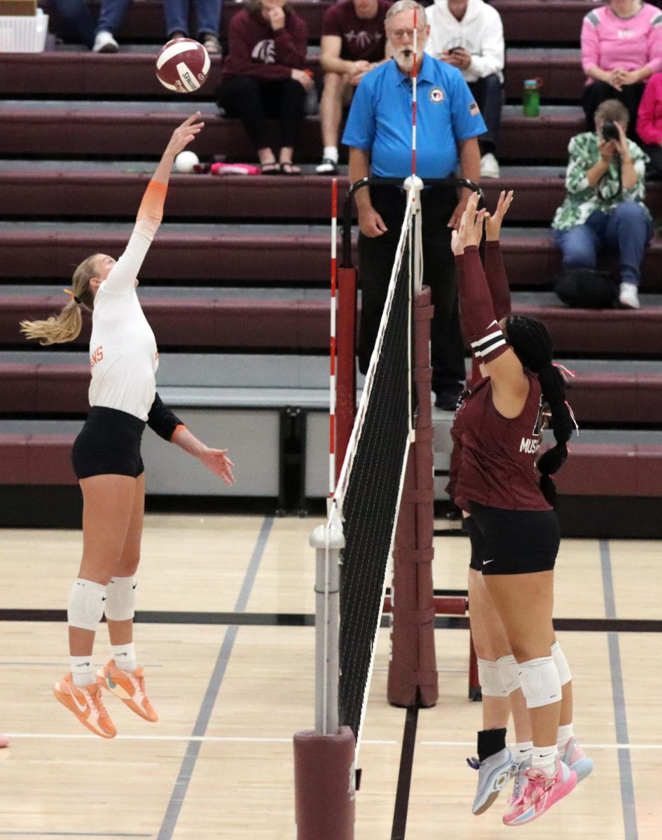 Jozie Lahr attempts one of her nine kills against Independence Tuesday, October 7. The senior hit a career milestone with her 300th block in a 3-0 sweep of the Mustangs
