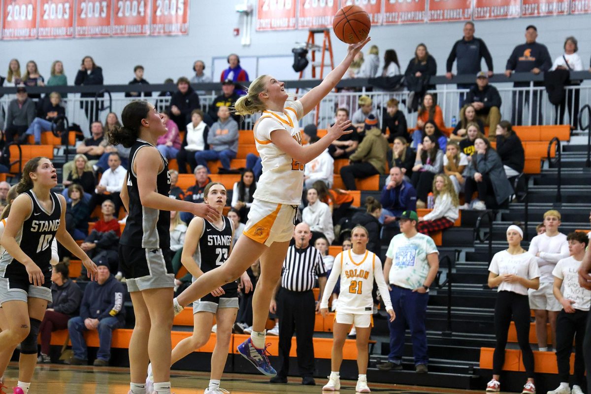 Solon’s Tenley Levin (23) jumps for a layup against Mount Vernon during the Spartans’ home game on Tuesday, December 16, 2025, at Solon High School