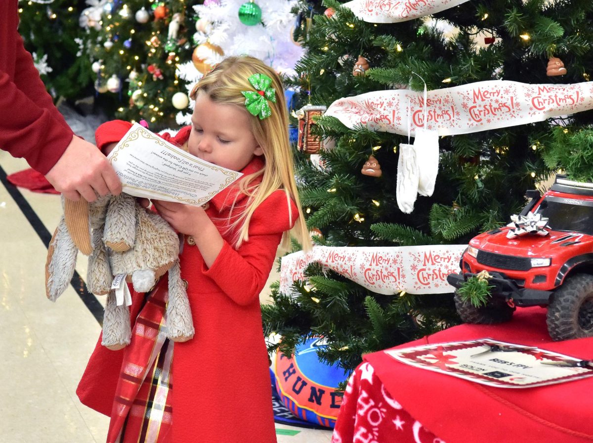 Little lady on a mission – Adalyn was on a quest to find all of the items in the 2025 Christmas Tree Walk & Arts Festival’s scavenger hunt. Successful completion of the hunt entitled the participant to a free cookie baked on-site. The event, held this past Saturday at the Family Life Center, has been a Solon tradition to start the Christmas season for well over a decade.