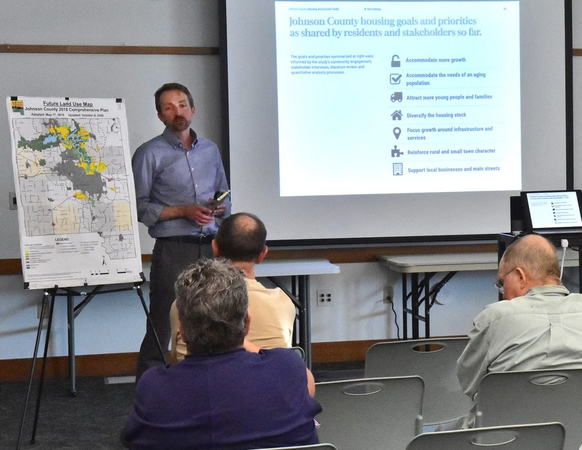 Jeff Sauser, co-founding principal of CommunityScale, a consulting firm specializing in urban planning based in Boston, explains a recent study on housing needs in small towns and the unincorporated areas of Johnson County during a Wednesday, Sept. 10 public information meeting at the Solon Public Library.