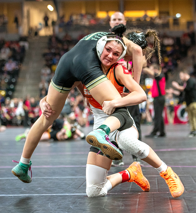 McKenna Rogers lifts her opponent during the first day of the 2025 IGHSAU State Wrestling Tournament at Xtream Arena in Coralville. Rogers entered the tourney ranked No. 4 at 110 lbs. by IAwrestle and went 1-2 to end the season with a 28-8 record. Rogers is one of four seniors on this season’s roster.