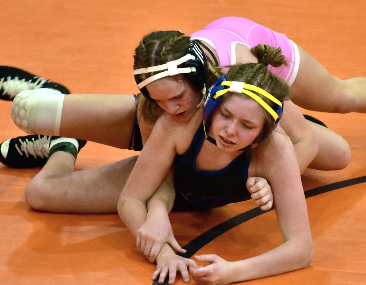 Stella Beck works on Benton Community’s Raya Wacha in a JV 115 lb. match Thursday, Jan. 15 at home. Beck pinned Wacha in 2:50.