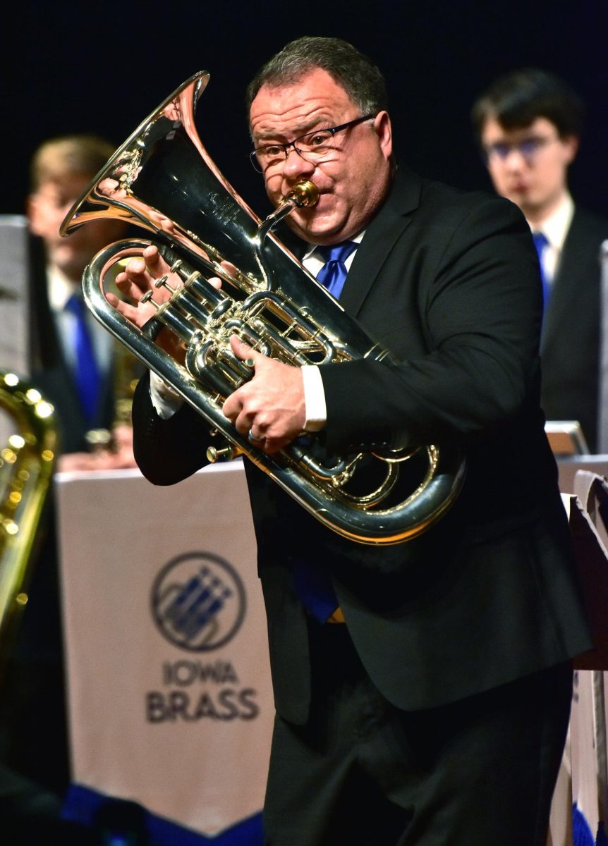 Todd Bransky, from Solon, performs a solo on his euphonium as Iowa Brass performs Paul Lovatt-Cooper’s Through the Flames, during a 2023 concert at the Solon Community Center.