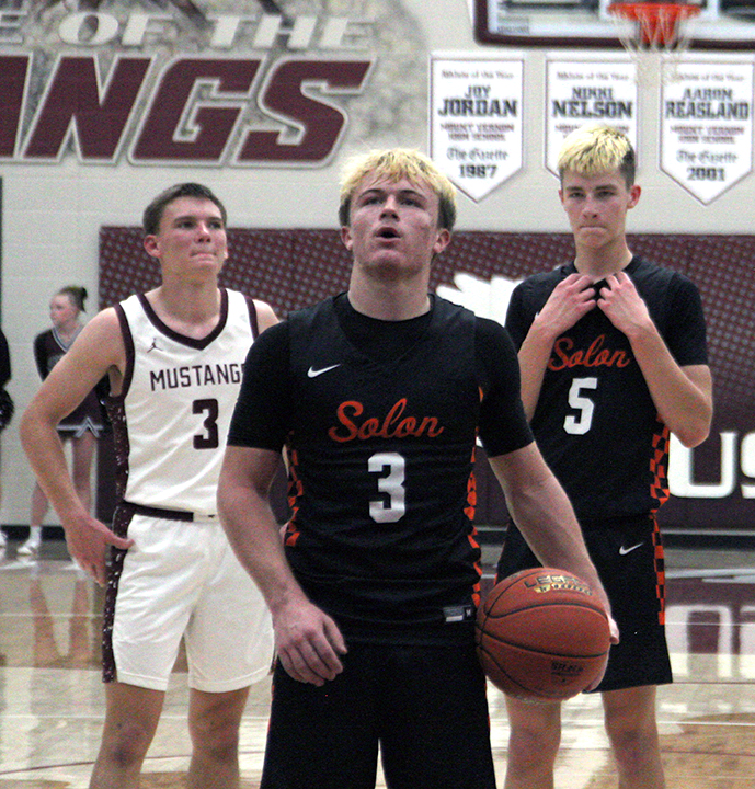 Maddox Kelley (3) takes a deep breath before taking a free throw Friday, Jan. 23, in Mount Vernon. Kelley had the game of a lifetime with 24 points and 11 rebounds to lead his team to victory, 64-50, over the Mustangs.