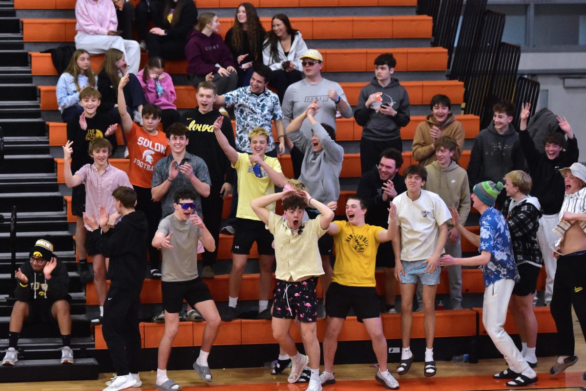 The Spartan student section reacts to a three-point basket by Tyler Greazel with 2:41 remaining in the game Friday, Feb. 6 against Independence. The Spartans hammered the Mustangs 69-28.