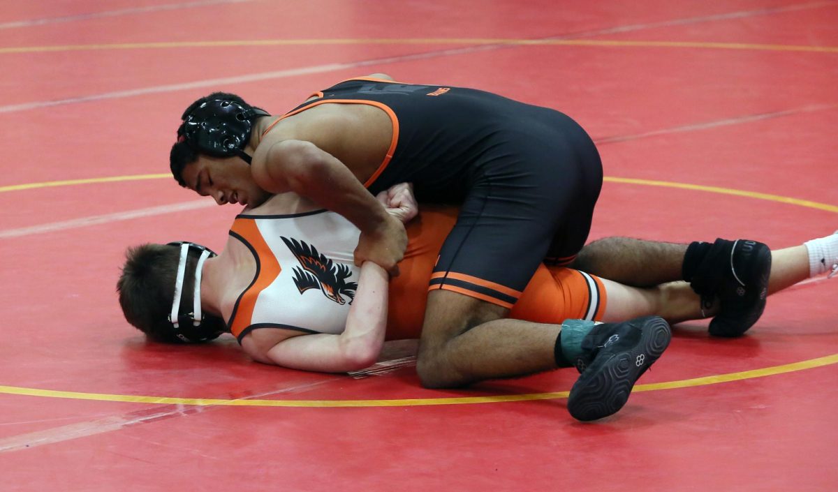 Jadyn Bevans works on top against West Delaware's Colten Roling. Jayden would eventually pick up the pin with only 0:27 seconds left in the 144 lb. quarterfinals match.