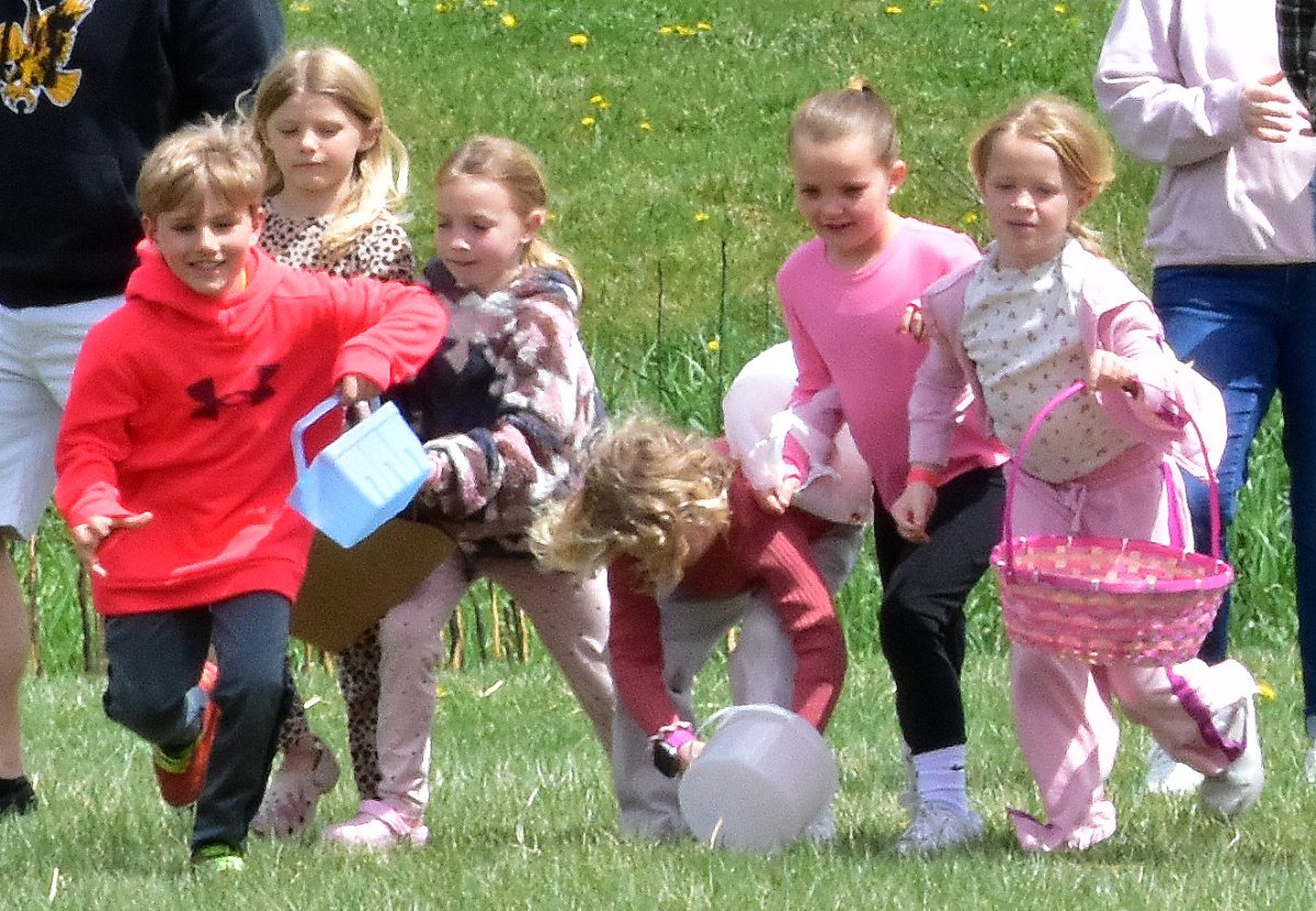 A group of kids hustles to gather plastic eggs full of candy during the 2025 Solon Optimist Club’s Easter Egg Hunt. 3,456 eggs were gathered within three minutes by 117 children. This year’s event is scheduled for Saturday, April 4 at the SRNA.