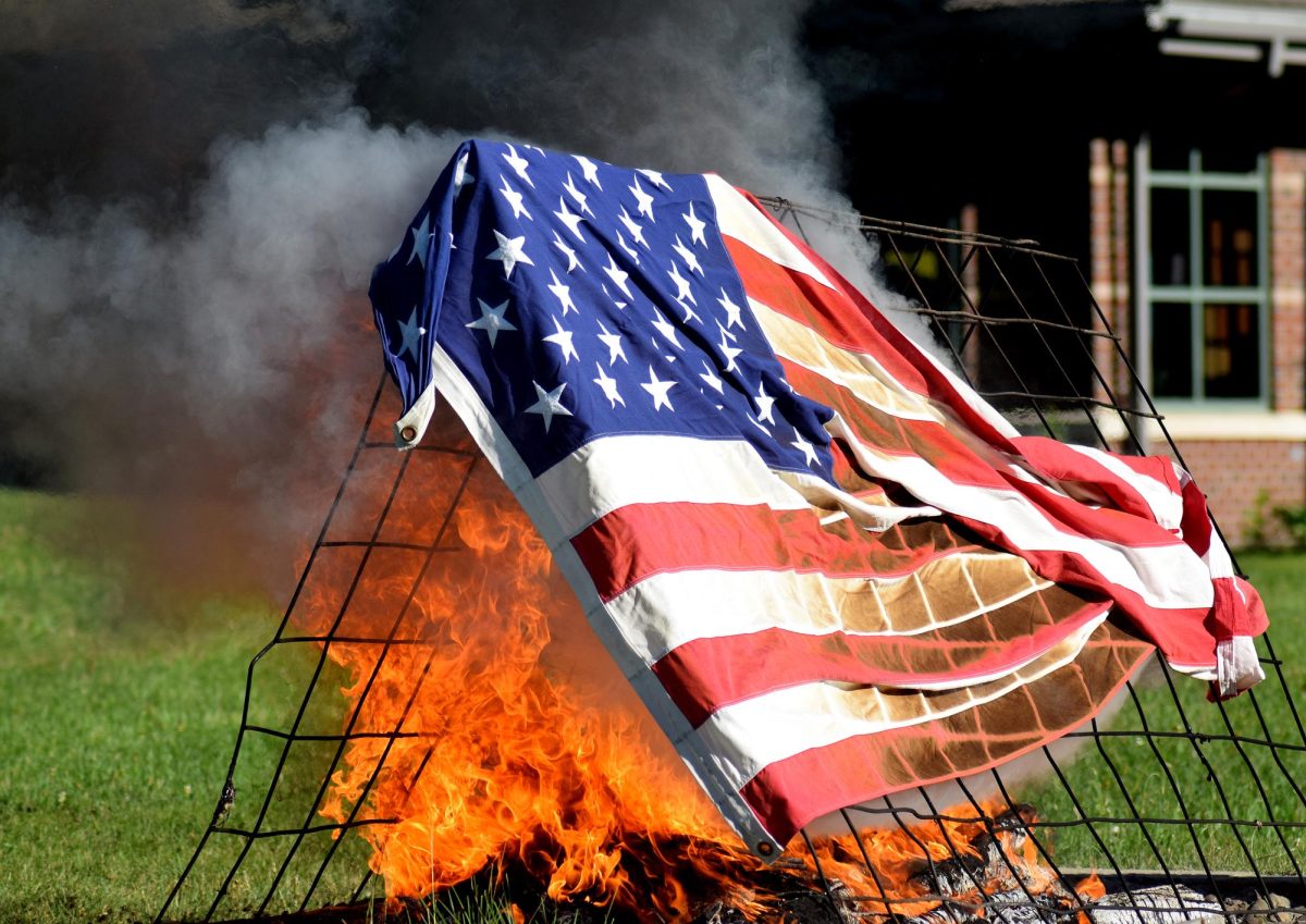 A flag is burned at the Solon American Legion Stinocher Post 460 Flag Retirement Ceremony in Solon on Sunday, June 14, 2026