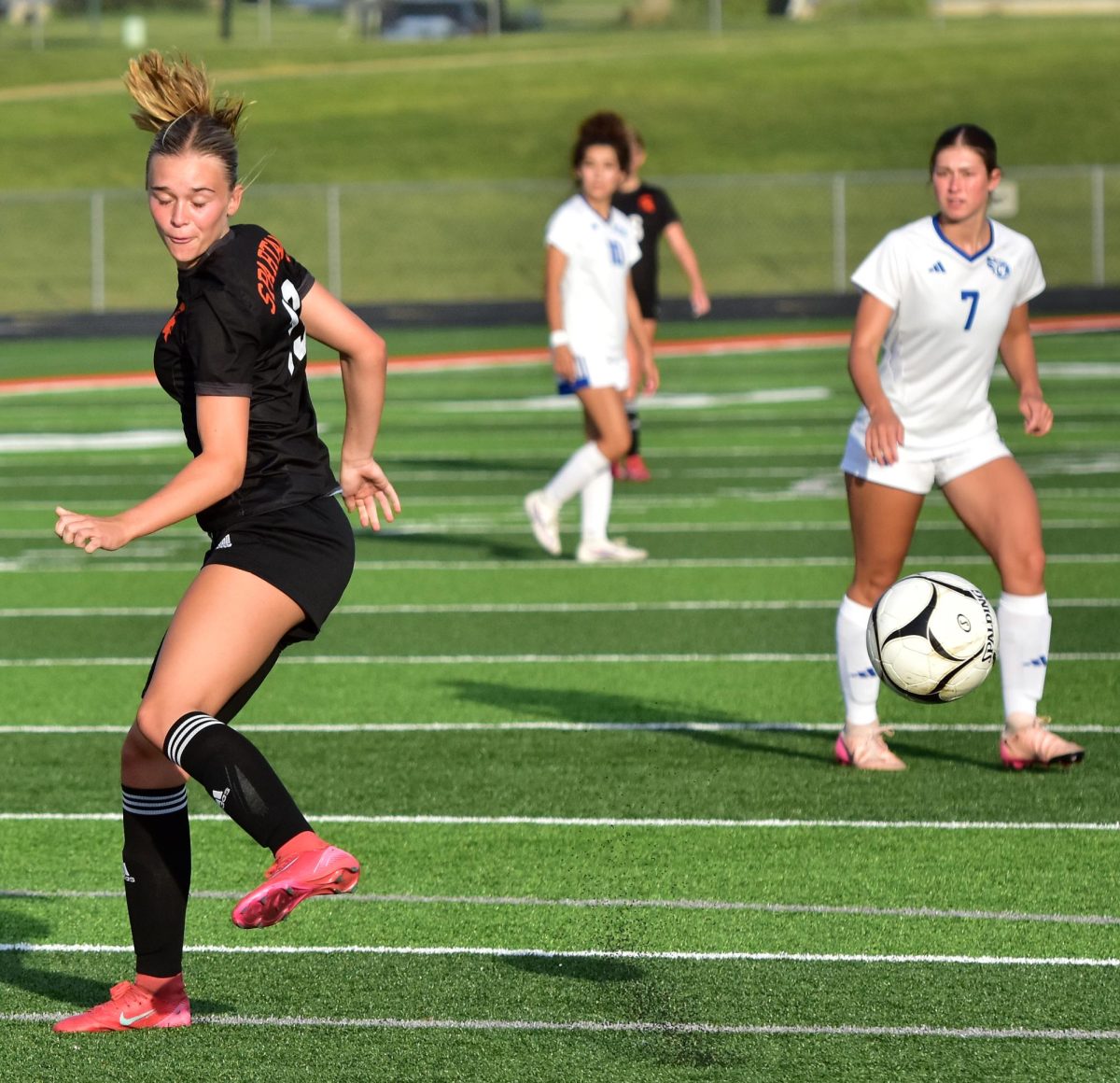 Jillian Janssen launches a pass Thursday, May 28, during a 1A Regional Quarterfinals match at home against the West Liberty Comets. The Lady Spartans hammered the Comets 10-0 (with two goals from Janssen, a junior) to advance to a semifinals match Tuesday, June 2 against West Branch.