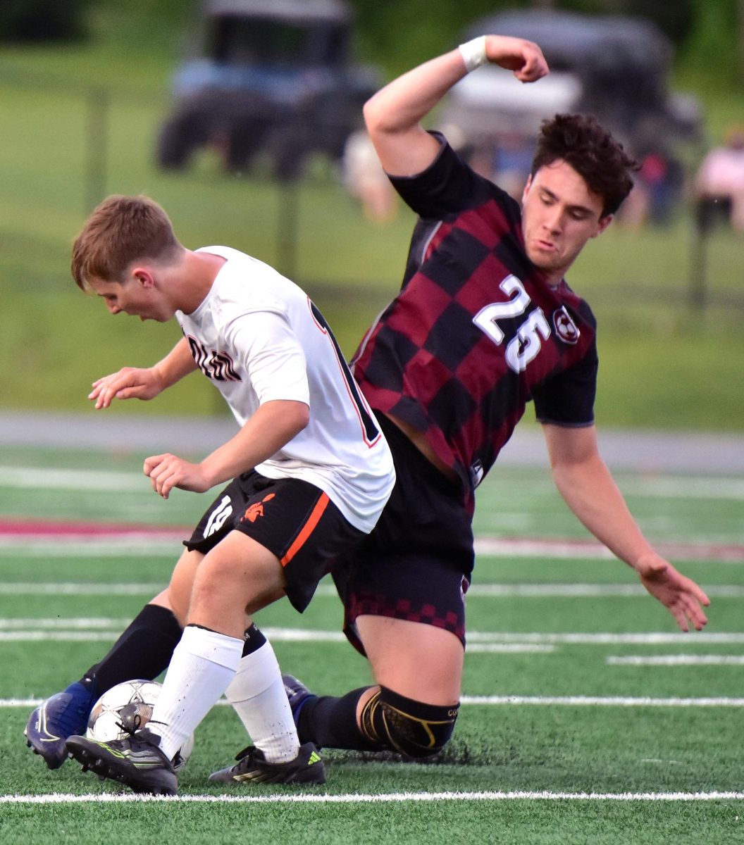 Mount Vernon senior Jaxon Anderson watches as sophomore Griffin Spence steals the ball Friday, May 29, in a Class 2A Substate Final match in Mount Vernon. Anderson’s goal in the second half led to a 1-0 win and advanced the No. 5-ranked Mustangs to the State Tournament and ended Solon’s season at 9-5-5.