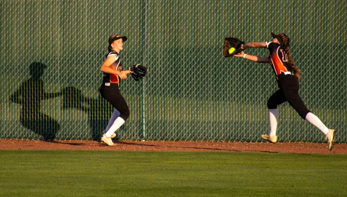 Center fielder Dillon Ostrander catches Maquoketa’s ball in the fourth inning of a Class 4A Region 7 quarterfinal game between the Lady Spartans and the Maquoketa Cardinals at Solon Softball Complex Thursday, July 9, 2026. The Spartans beat the Cardinals, 6-2 to advance to the semifinals Saturday, July 11, at Clear Creek Amana.